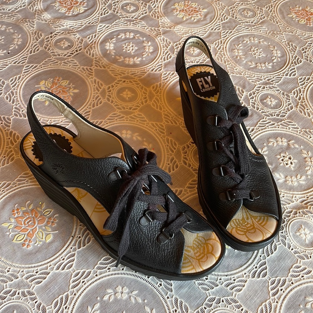 Fly London Wedges, never wore them. Too small for me.